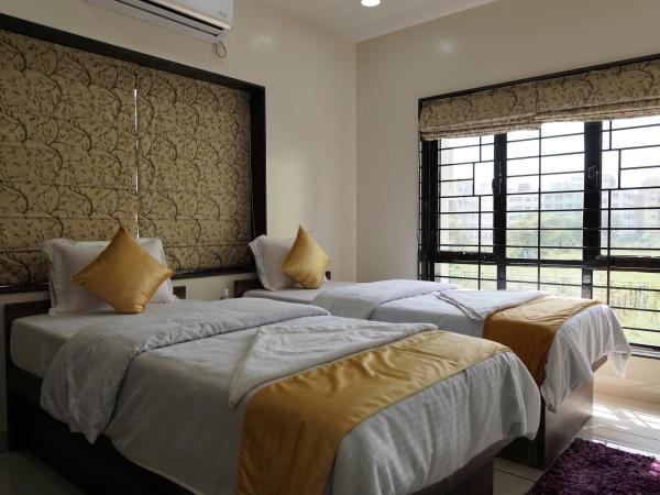 Rama Golden Root New town : photo 8 de la chambre chambre super deluxe avec climatisation