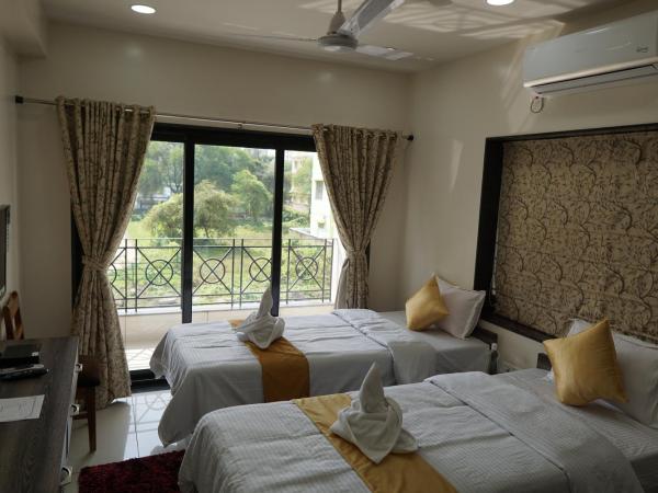 Rama Golden Root New town : photo 5 de la chambre chambre super deluxe avec climatisation