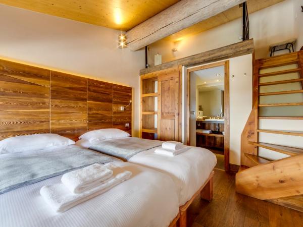 Chalet Hotel Du Fornet : photo 2 de la chambre chambre triple avec mezzanine