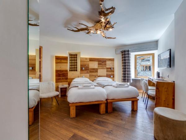 Chalet Hotel Du Fornet : photo 8 de la chambre chambre lits jumeaux standard