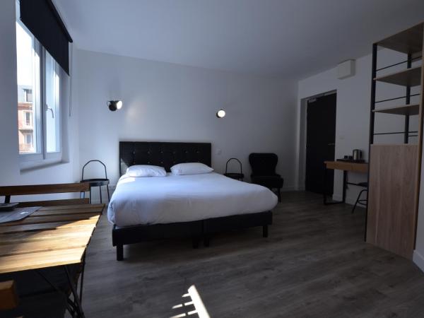 Hotel De Quebec : photo 6 de la chambre chambre triple