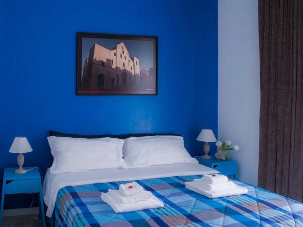 Melo Accommodations : photo 10 de la chambre chambre double ou lits jumeaux avec balcon