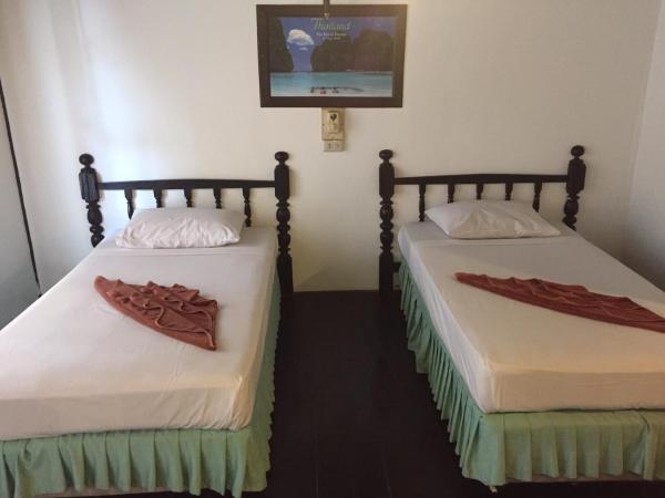 Tropical Garden Bungalow : photo 3 de la chambre hébergement lits jumeaux avec climatisation - vue sur jardin