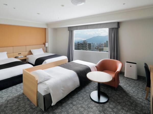 Sapporo Excel Hotel Tokyu : photo 2 de la chambre chambre lits jumeaux supérieure avec lit d'appoint - non-fumeurs - Étage standard