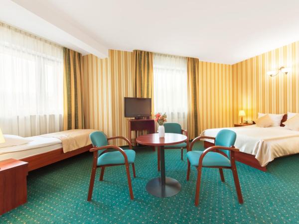 Hotel Arkadia : photo 5 de la chambre chambre familiale (2 adultes + 1 enfant)