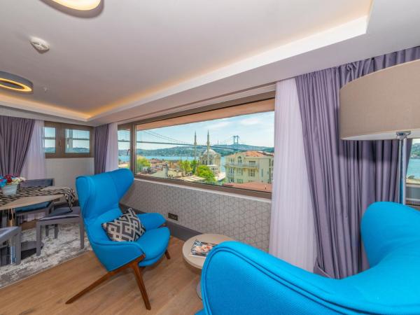 Feri Suites : photo 5 de la chambre chambre lit king-size deluxe - vue sur mer - annexe