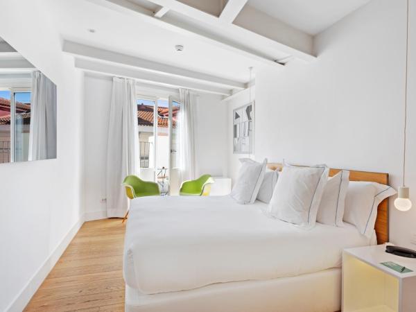 One Shot Prado 23 : photo 1 de la chambre chambre double ou lits jumeaux supérieure avec terrasse