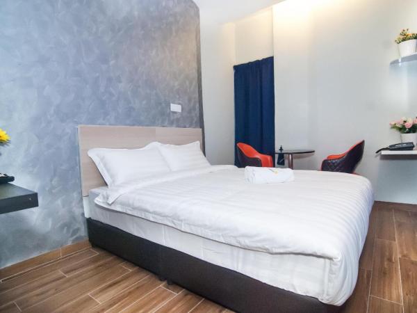 GOOD 9 HOTEL - Bukit Dahlia : photo 1 de la chambre chambre lit queen-size 