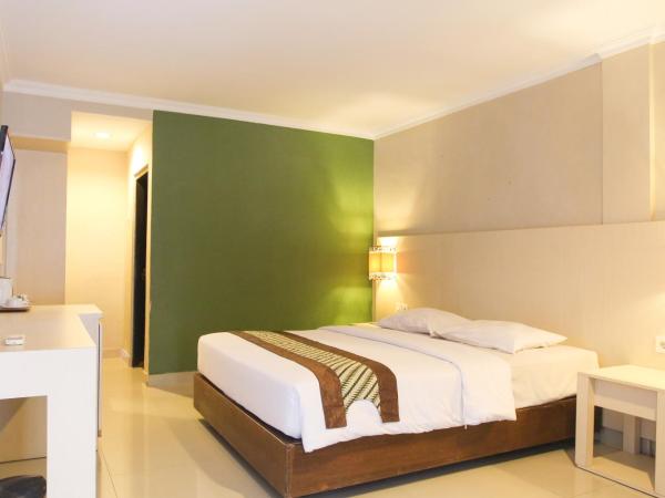 Cakra Kusuma Hotel : photo 4 de la chambre chambre lit queen-size deluxe