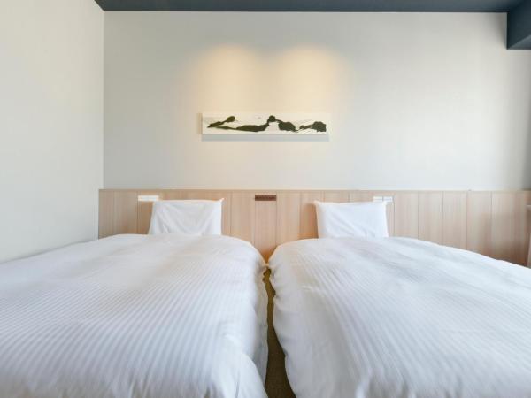 Vessel Hotel Campana Susukino : photo 1 de la chambre chambre lits jumeaux moyenne - non-fumeurs