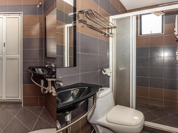 Sunshine Inn : photo 7 de la chambre chambre lits jumeaux deluxe