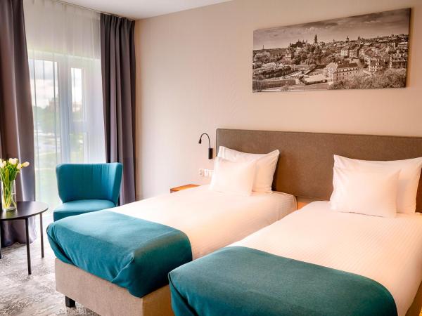 Focus Hotel Premium Lublin : photo 1 de la chambre chambre lits jumeaux