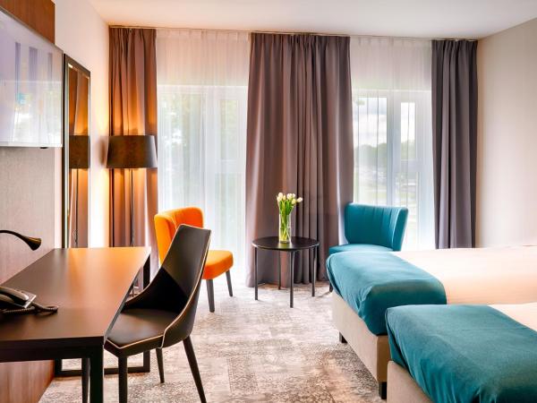 Focus Hotel Premium Lublin : photo 4 de la chambre chambre lits jumeaux