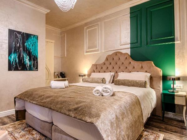 Riva Palace - design rooms : photo 4 de la chambre chambre deluxe double ou lits jumeaux