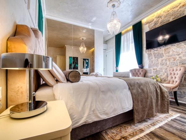 Riva Palace - design rooms : photo 6 de la chambre chambre deluxe double ou lits jumeaux