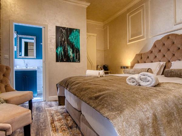 Riva Palace - design rooms : photo 3 de la chambre chambre deluxe double ou lits jumeaux