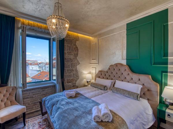 Riva Palace - design rooms : photo 5 de la chambre chambre deluxe double ou lits jumeaux
