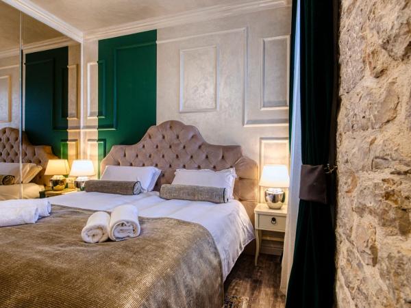 Riva Palace - design rooms : photo 10 de la chambre chambre deluxe double ou lits jumeaux