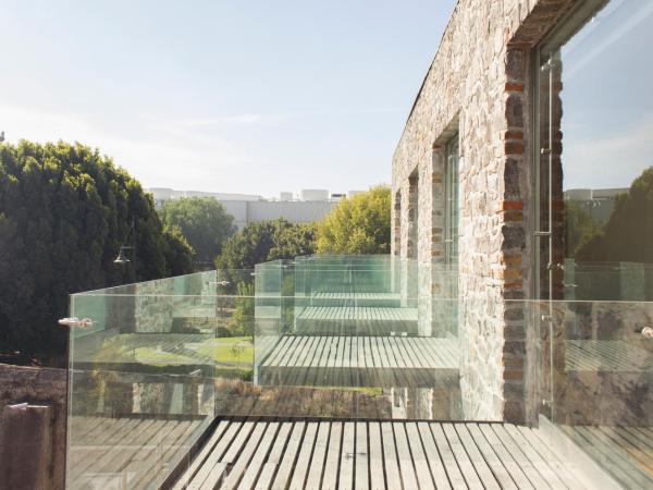 La Purificadora, Puebla, a Member of Design Hotels : photo 2 de la chambre suite d'angle avec balcon