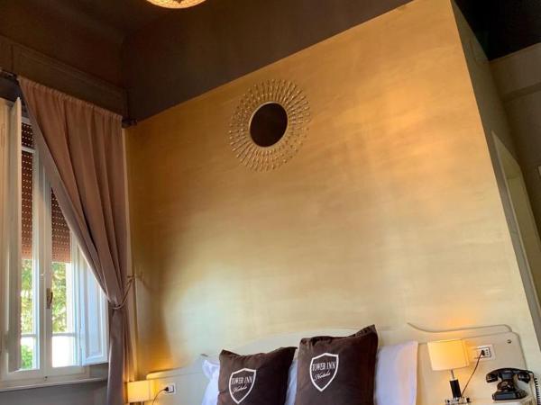 Villa Tower Inn : photo 10 de la chambre chambre familiale quadruple