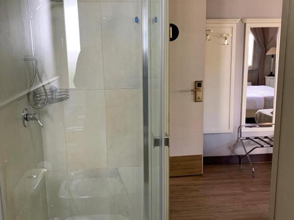 Villa Tower Inn : photo 3 de la chambre chambre familiale quadruple