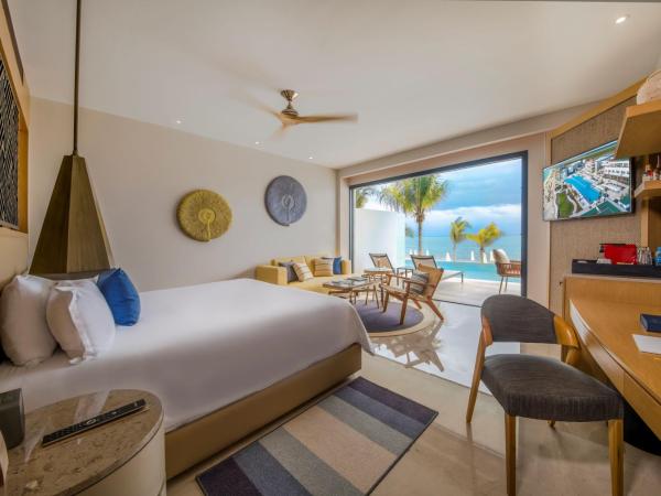 Haven Riviera Cancun - All Inclusive - Adults Only : photo 3 de la chambre suite junior club serenity avec accès direct à la piscine - côté océan