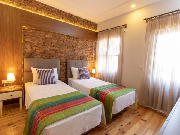 Mono Hotel : photo 10 de la chambre chambre double ou lits jumeaux - vue sur ville