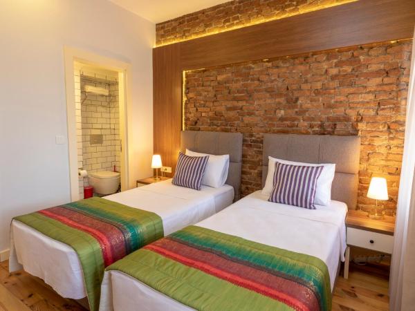 Mono Hotel : photo 9 de la chambre chambre double ou lits jumeaux - vue sur ville