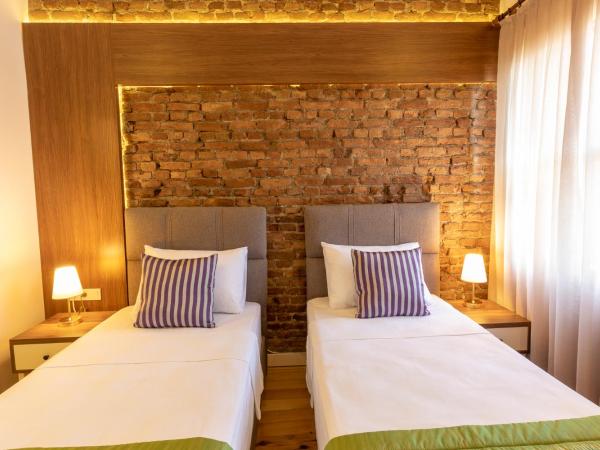 Mono Hotel : photo 8 de la chambre chambre double ou lits jumeaux - vue sur ville