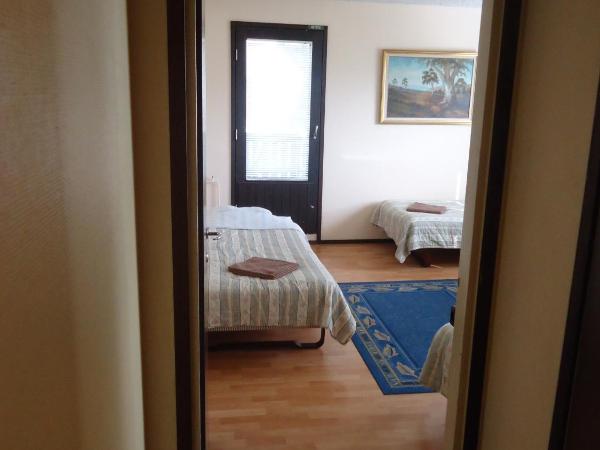Hotel Lamminpää : photo 3 de la chambre chambre triple avec salle de bains commune