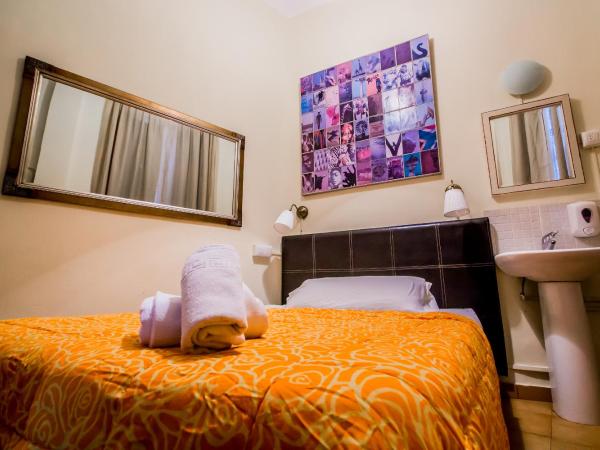 Nuevo Suizo : photo 1 de la chambre chambre simple avec salle de bains 