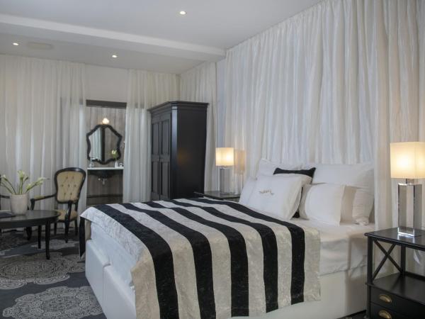 Erla Villa : photo 2 de la chambre chambre supérieure lit queen-size