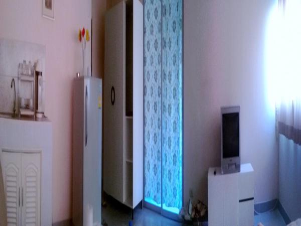 DMK Don Mueang Airport Guest House : photo 4 de la chambre appartement