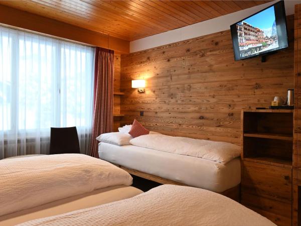 Hotel Bernerhof Grindelwald : photo 3 de la chambre chambre triple standard