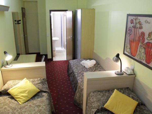 Hotel Lugano : photo 2 de la chambre chambre triple