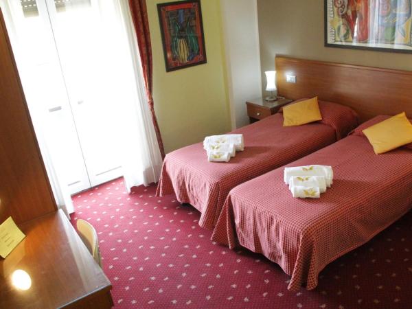 Hotel Lugano : photo 3 de la chambre chambre lits jumeaux