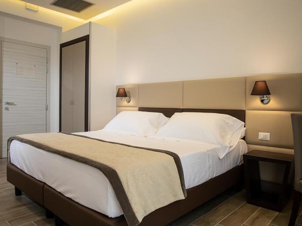 Hotel Palazzo Argenta : photo 1 de la chambre chambre familiale supérieure