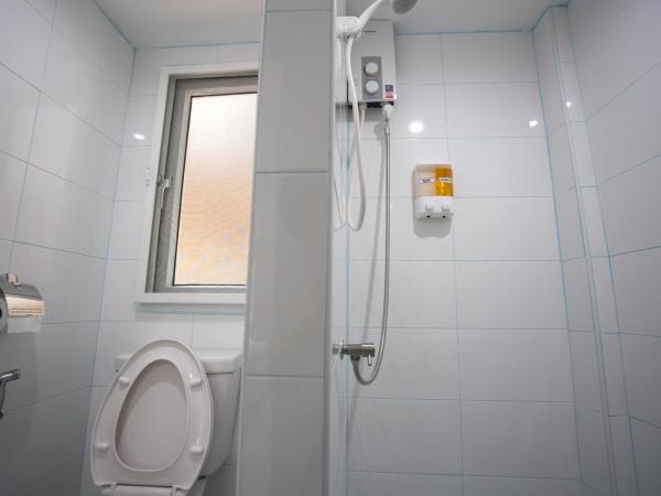 Dhub Hostel Donmueng : photo 5 de la chambre chambre triple basique