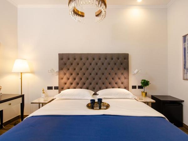 Villa Brandestini : photo 10 de la chambre chambre lit king-size supérieure