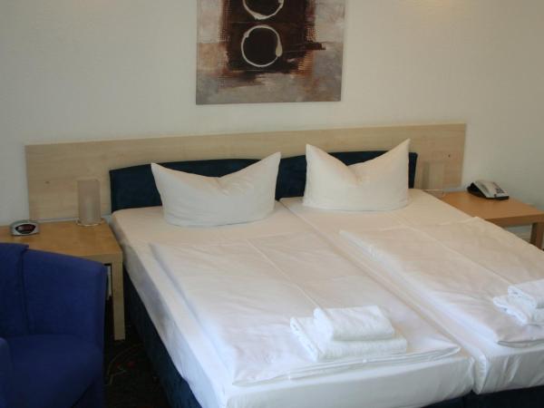 Hotel Seifert Berlin am Kurfürstendamm : photo 3 de la chambre grande chambre double ou lits jumeaux