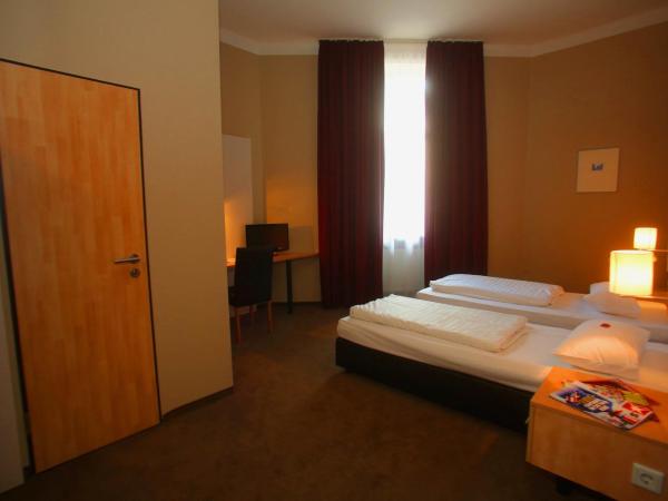 Hotel Columbus : photo 3 de la chambre chambre triple