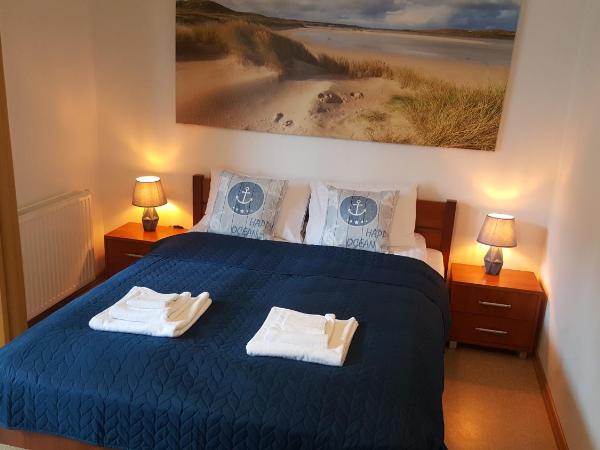 Villa Kapitańska : photo 6 de la chambre chambre double avec salle de bains privative et balcon