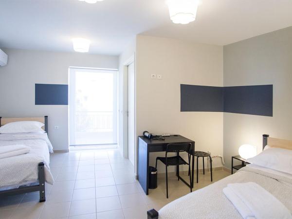Snooze H : photo 2 de la chambre chambre lits jumeaux standard