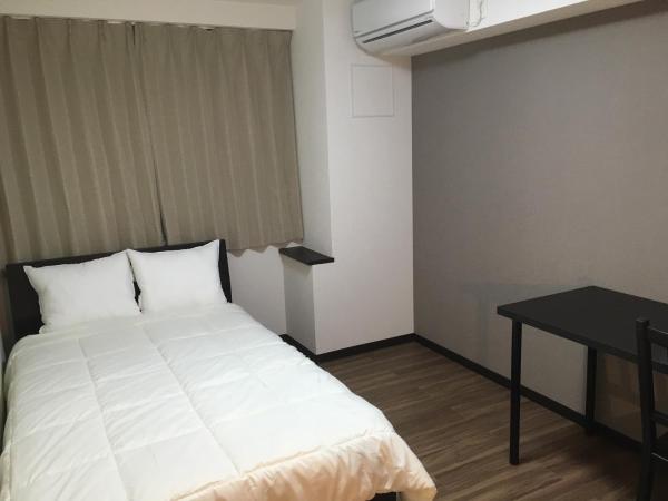 TIMES INN 2F : photo 1 de la chambre chambre double standard avec salle de bains commune