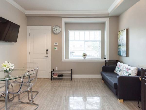 Rare Find Exquisitely New Quiet & Safe Skytrain Home : photo 3 de la chambre suite lit queen-size