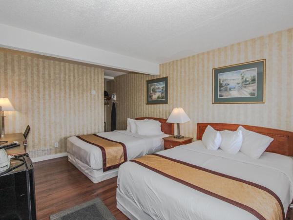 Canadas Best Value Inn Chinook Station : photo 2 de la chambre chambre 2 lits queen-size - non-fumeurs