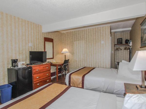 Canadas Best Value Inn Chinook Station : photo 6 de la chambre chambre 2 lits queen-size - non-fumeurs