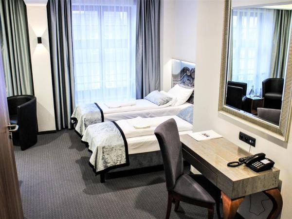 Celestin Residence : photo 4 de la chambre chambre triple deluxe
