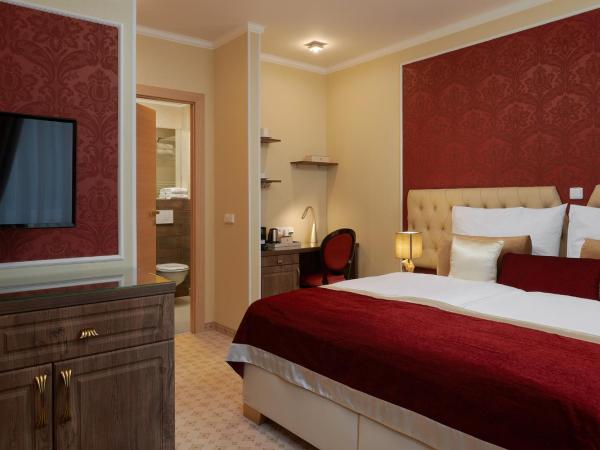 Honour and Grace Hotel : photo 3 de la chambre chambre deluxe double ou lits jumeaux