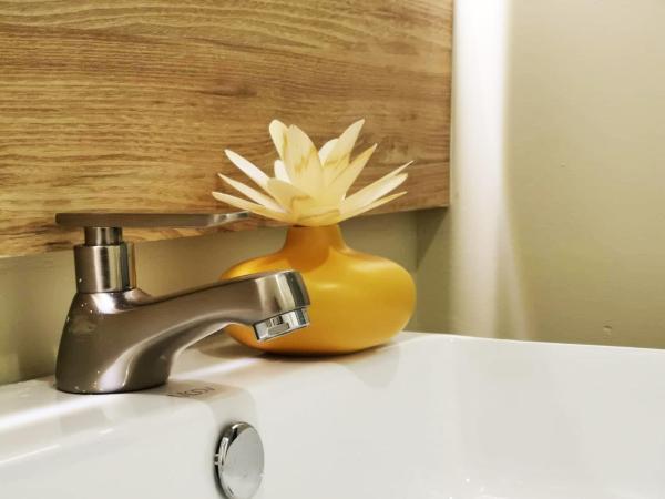 Oikos Poshtel : photo 6 de la chambre chambre familiale deluxe